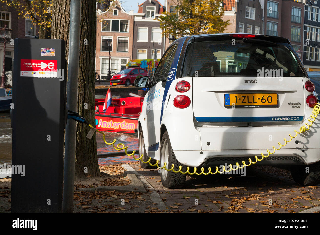 EV / Electric car / electrically powered cars being charged / having