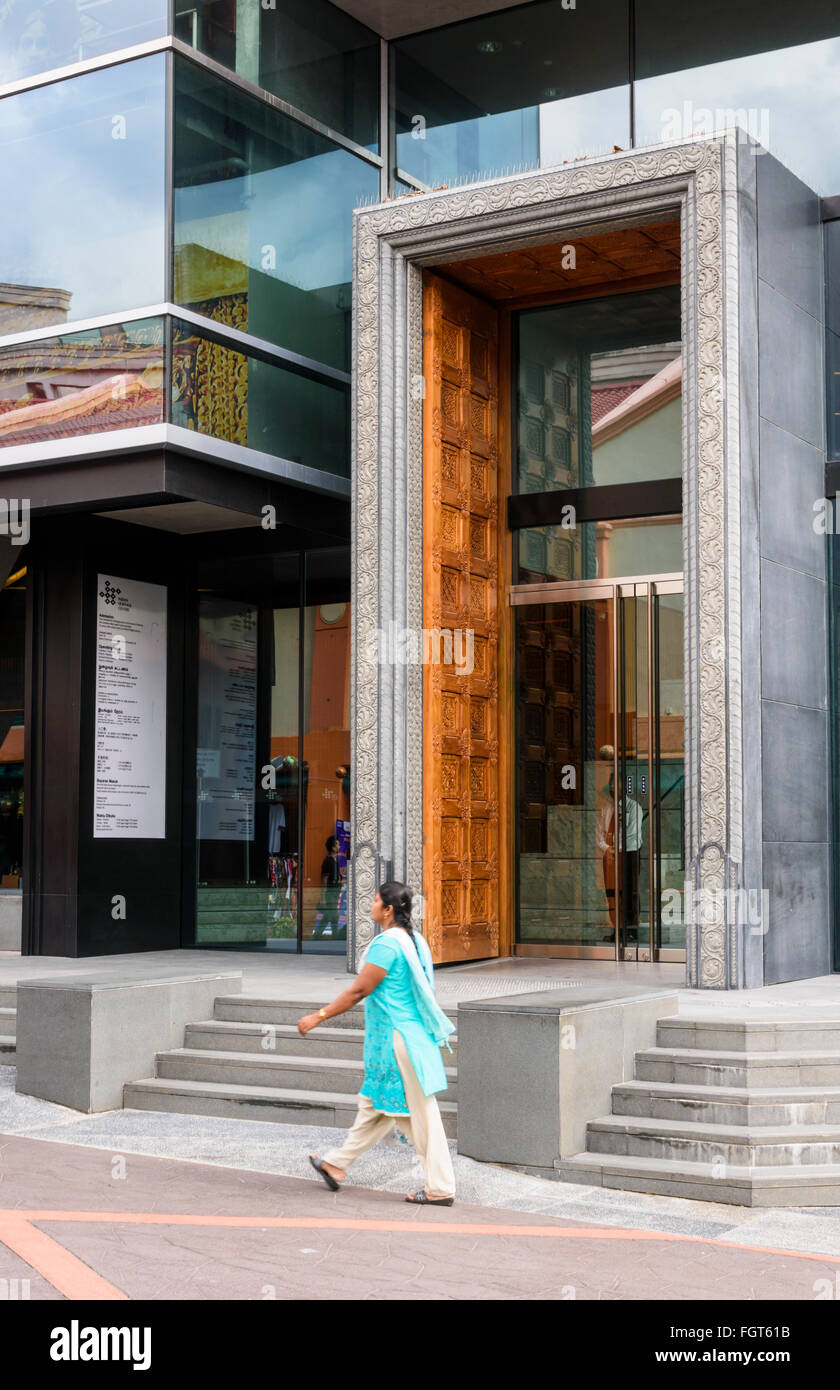 A woman walks past the Indian Heritage Centre, Little India, Singapore Stock Photo