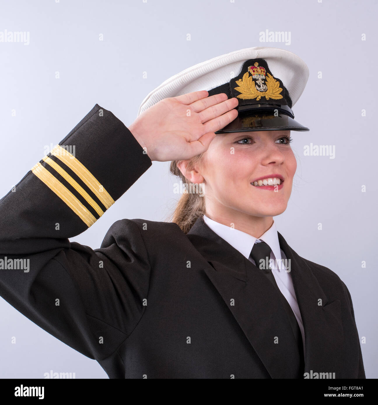 Saluting woman hi-res stock photography and images - Alamy
