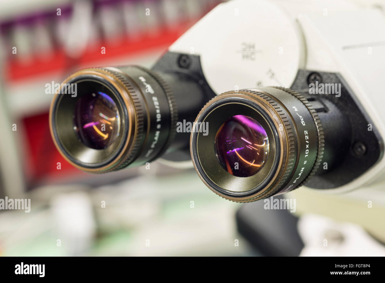 Lenses of a microscope in a hospital pathology laboratory. Stock Photo