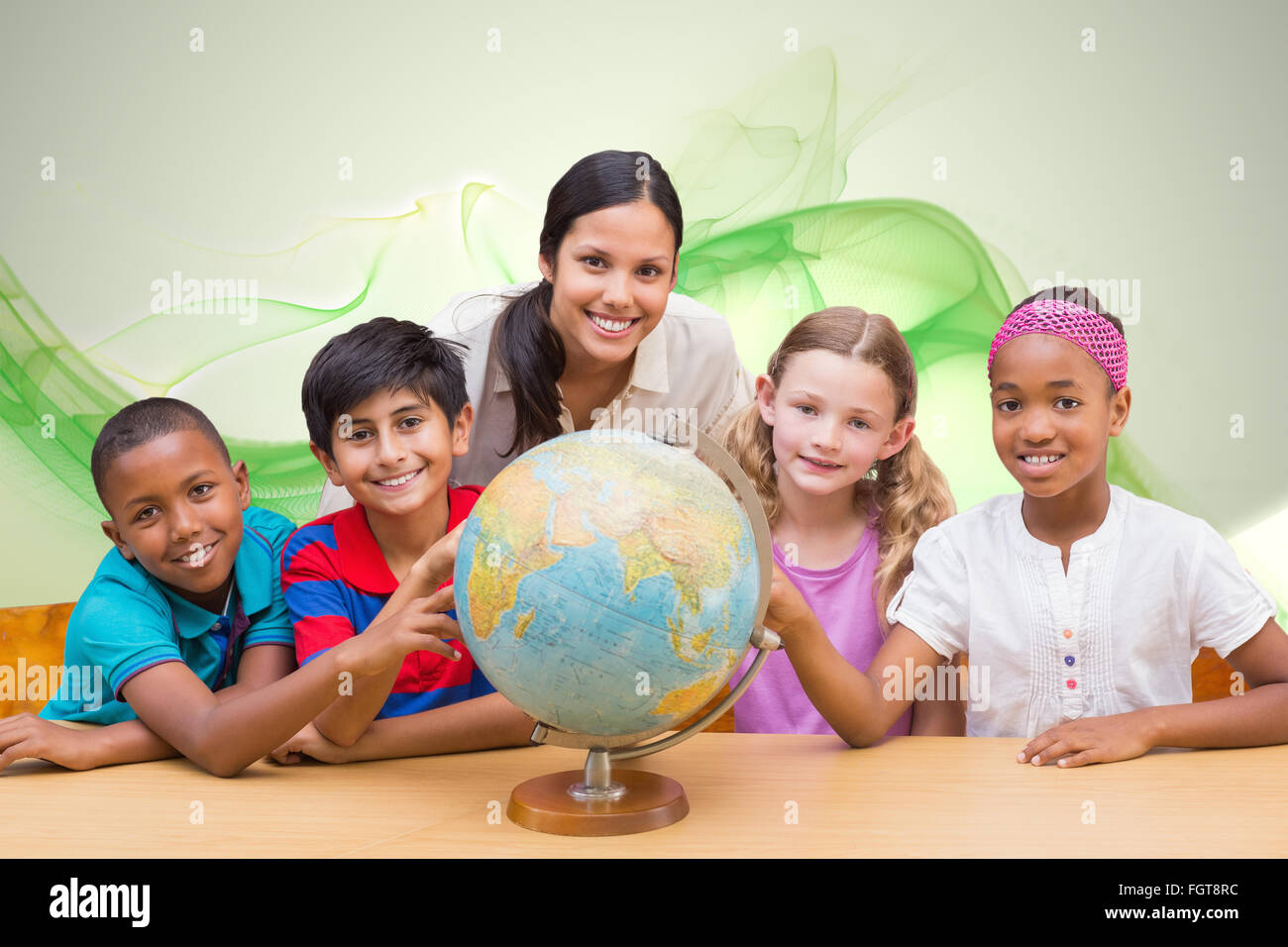 Composite image of cute pupils and teacher looking at globe in library ...