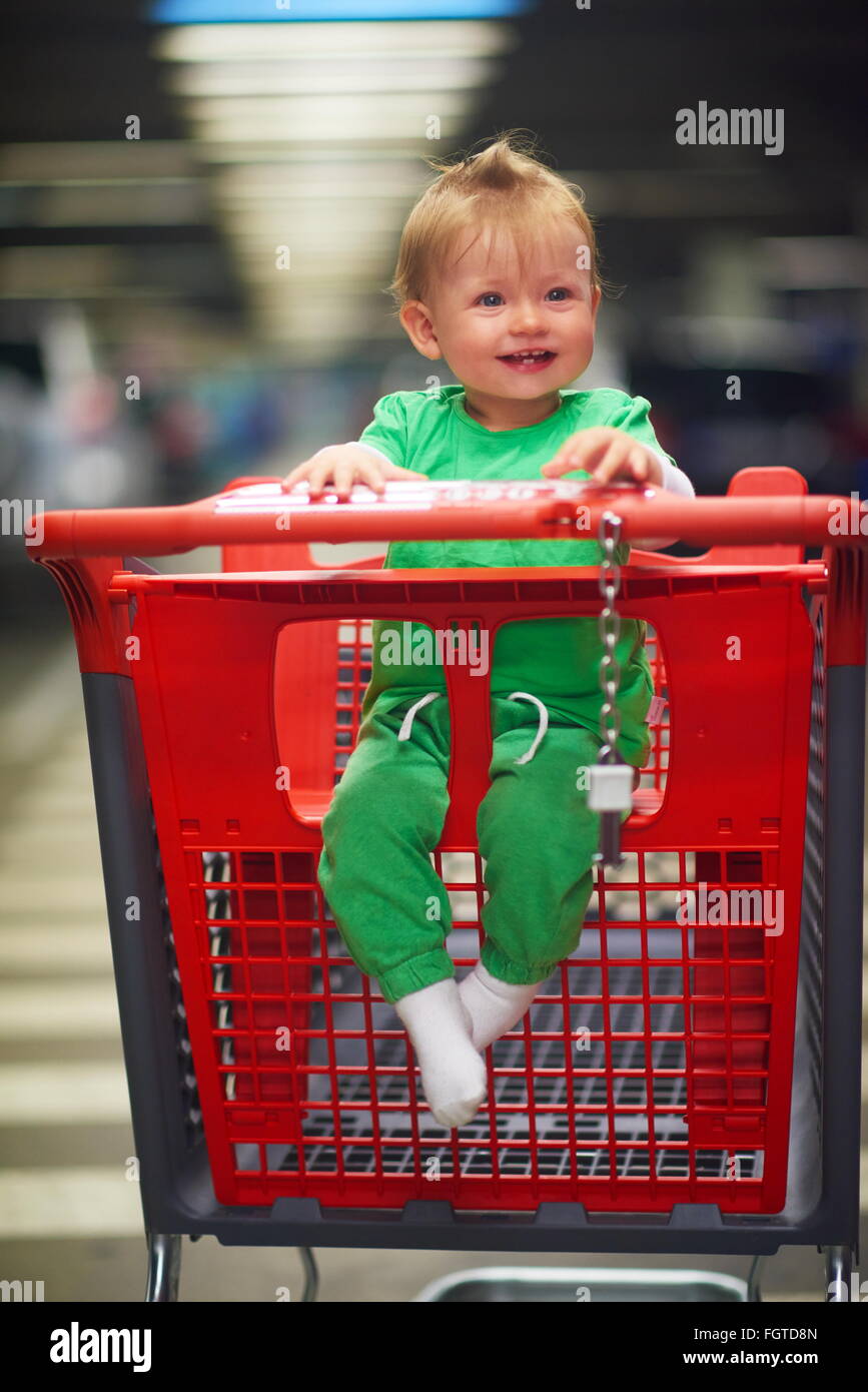 baby in shopping cart Stock Photo Alamy