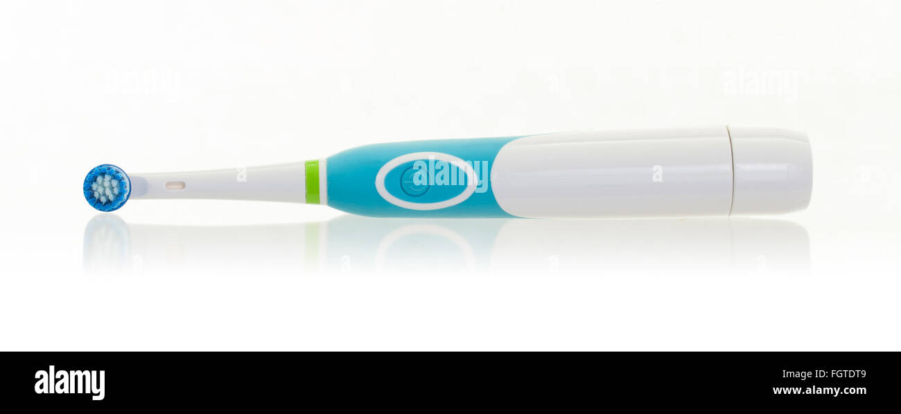 Electric toothbrush isolated on a white background Stock Photo - Alamy