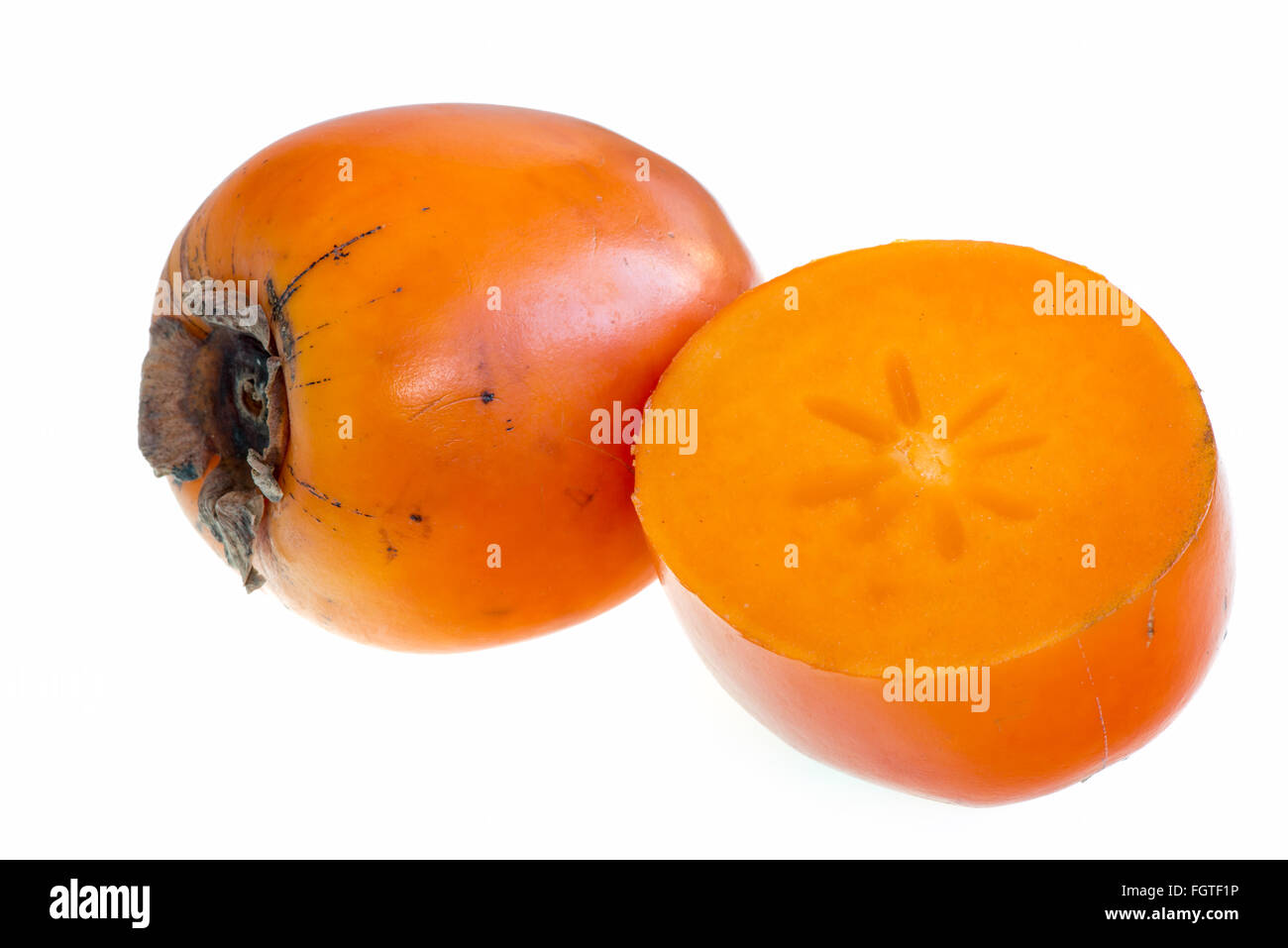 Persimmon on a white background Stock Photo Alamy