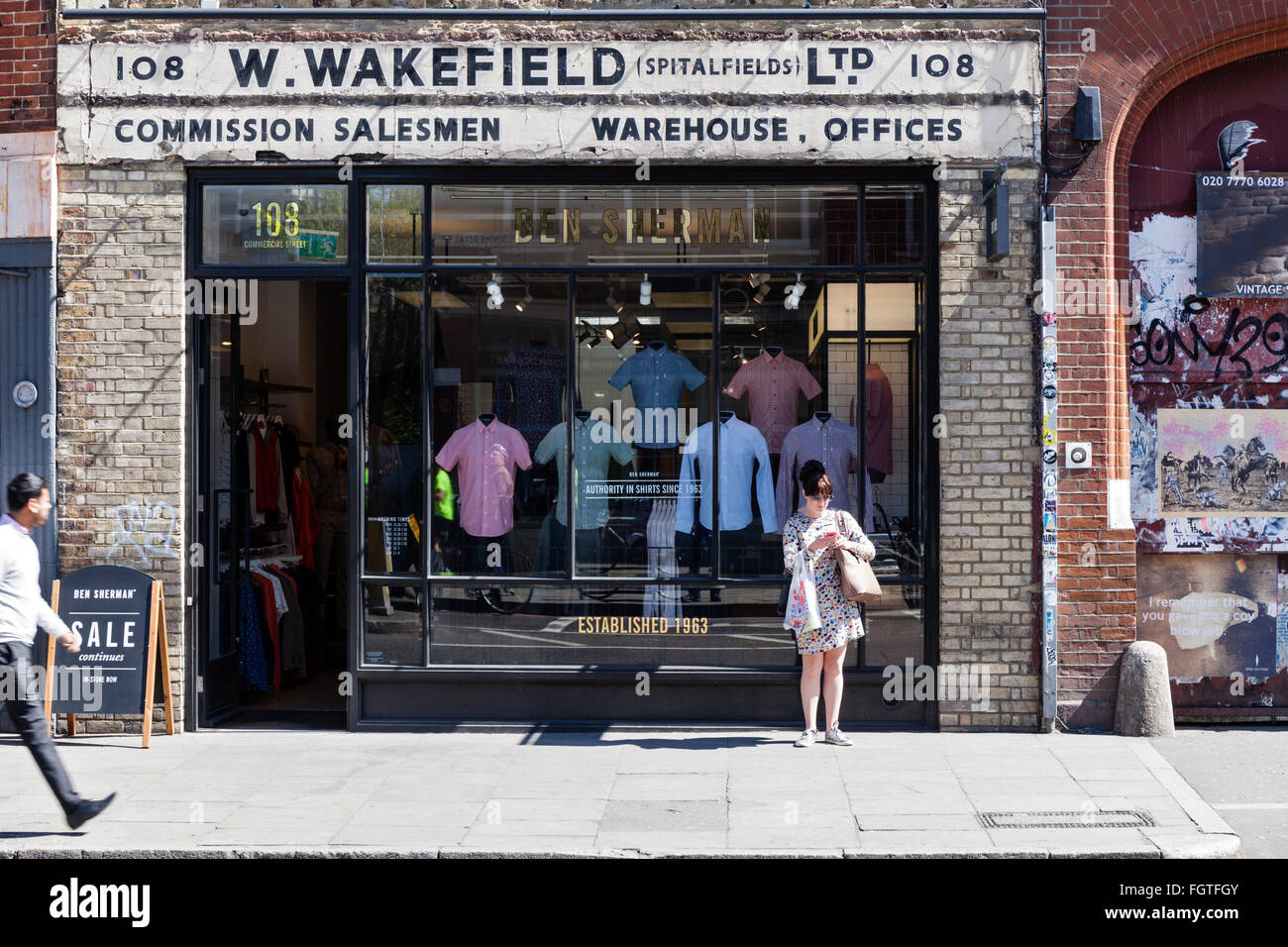 Old fashioned clothing shop on Commercial Street in Shoreditch, London. Stock Photo