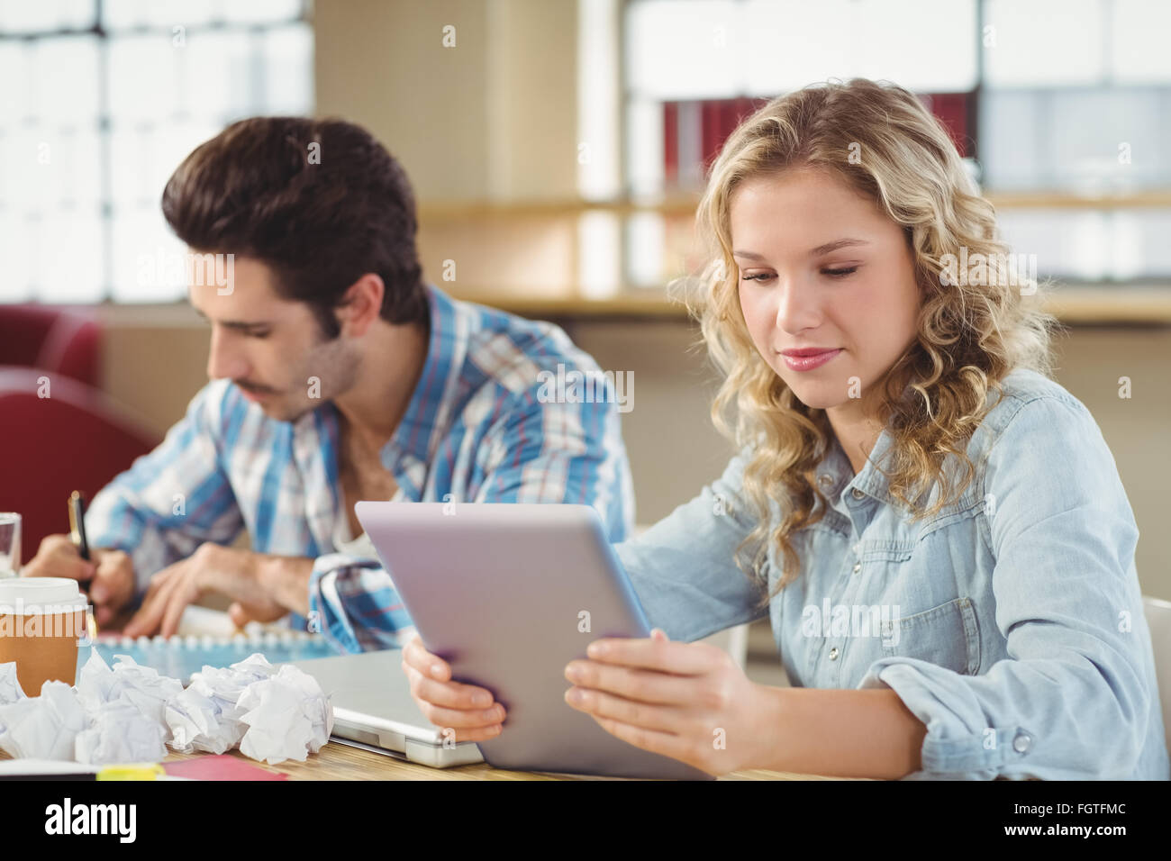 Woman holding digital tablet Stock Photo - Alamy