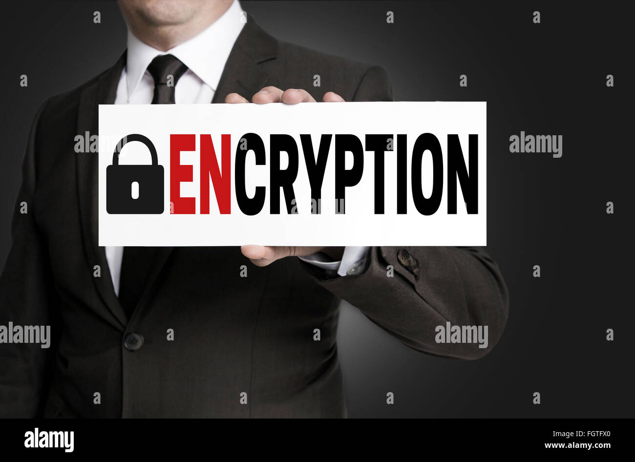 encryption sign is held by businessman. Stock Photo