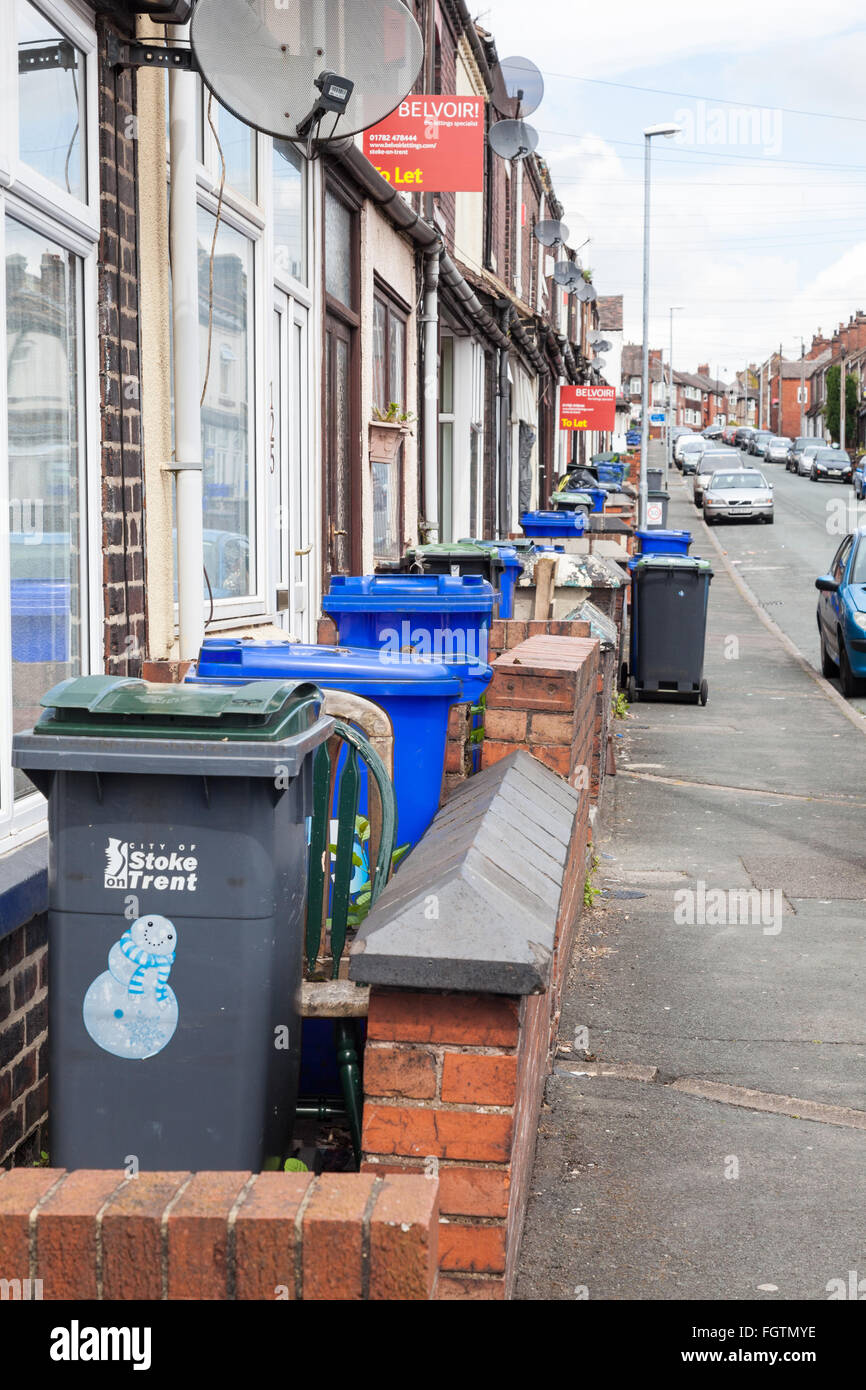 wheelie-bins-outside-terraced-housing-in-stoke-on-trent-staffordshire-FGTMYE.jpg