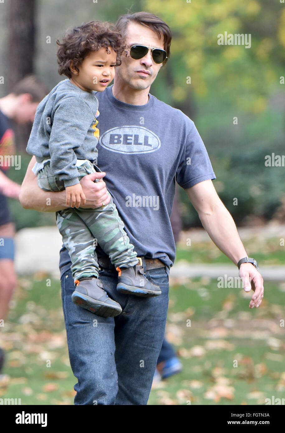 Olivier Martinez and his son play soccer at Coldwater Canyon Park in Beverly Hills  Featuring: Olivier Martinez, Maceo Martinez Where: Los Angeles, California, United States When: 16 Jan 2016 Stock Photo