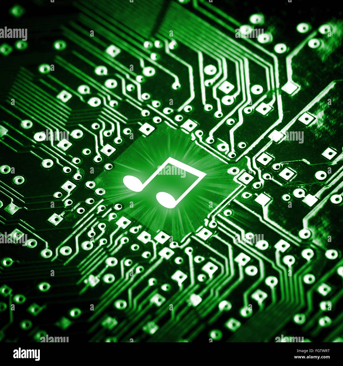 Music note on computer chip Stock Photo