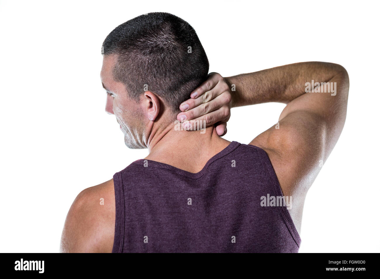 Rear view of athlete with neck pain Stock Photo Alamy