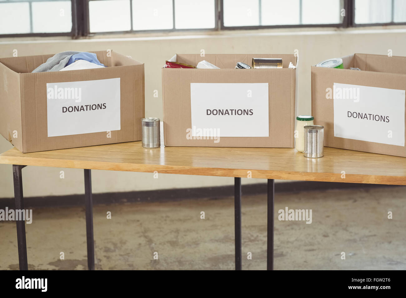 Cardboard donation boxes on table Stock Photo Alamy