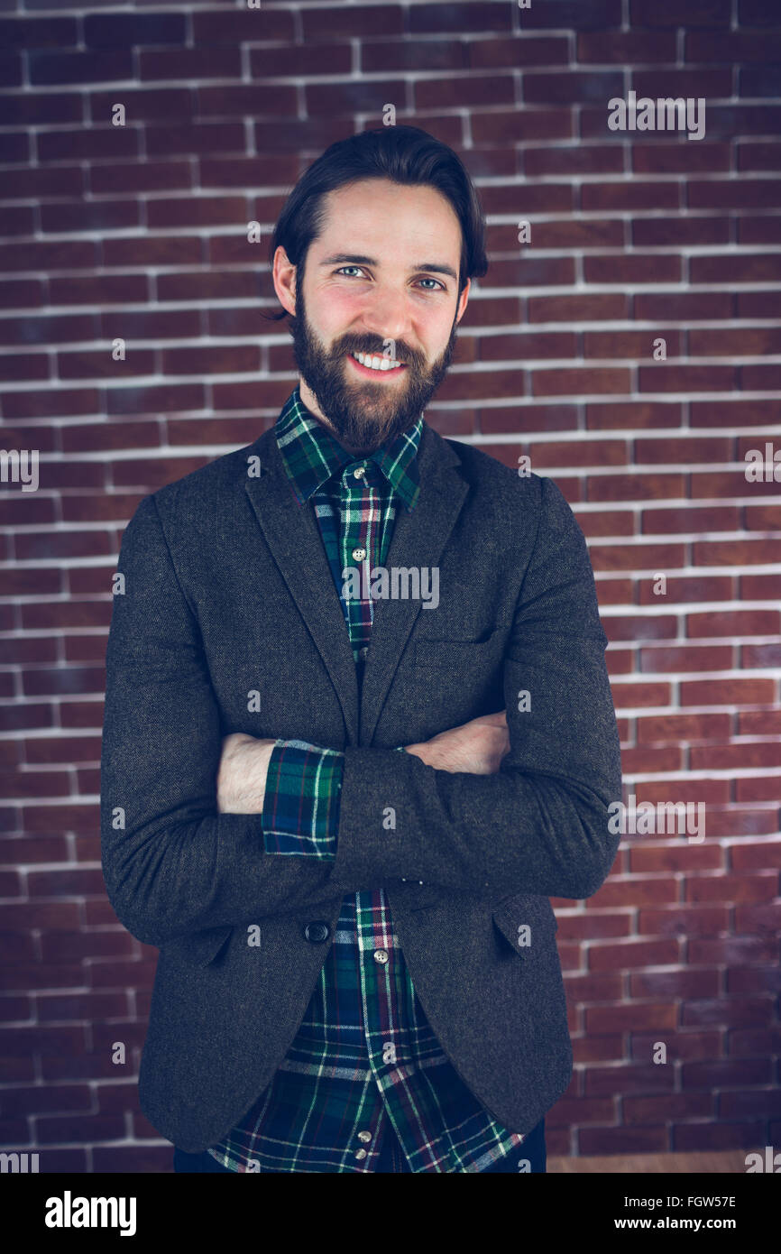 Portrait of smiling man with arms crossed Stock Photo - Alamy