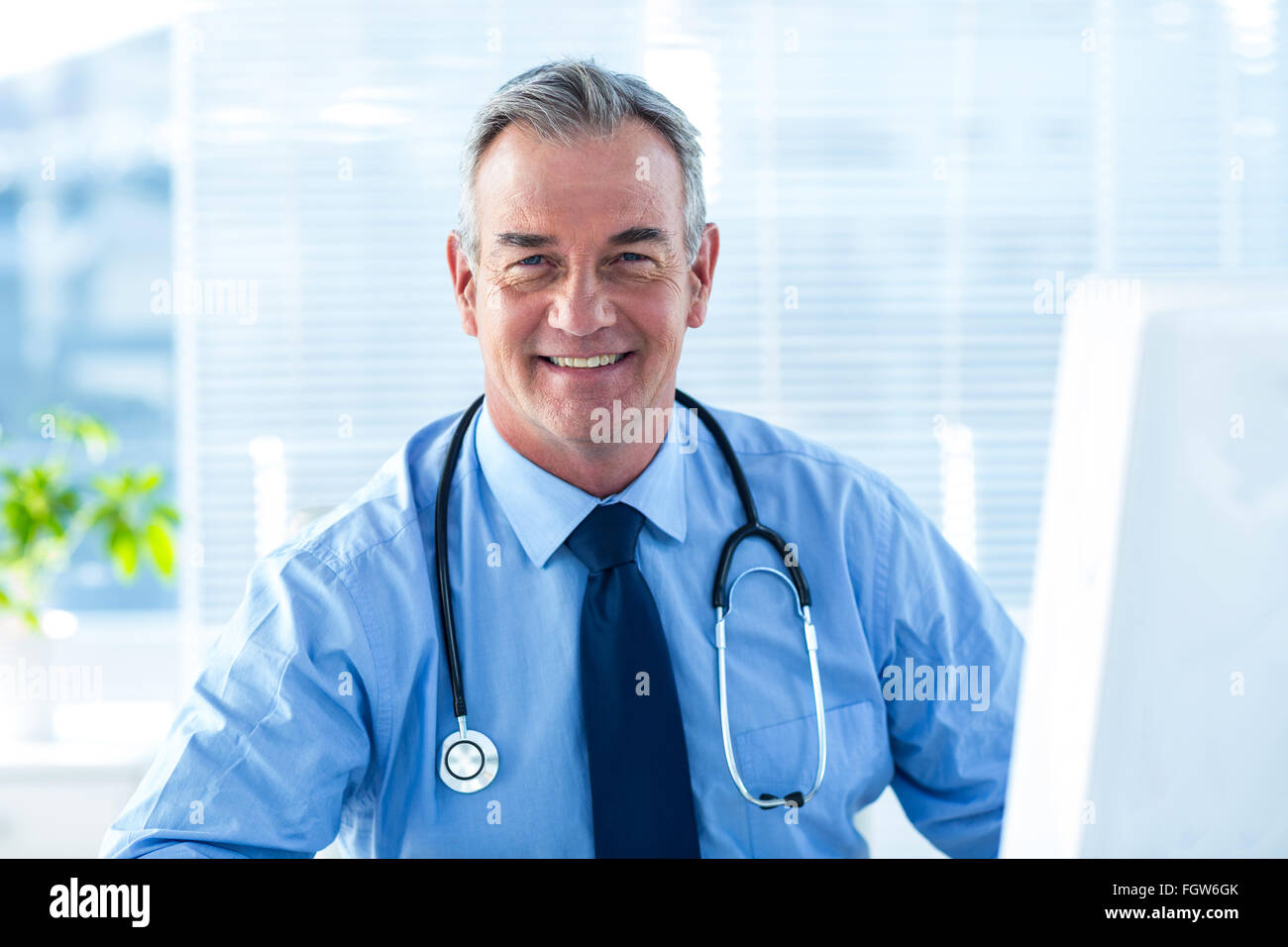 Portrait of smiling male doctor in hospital Stock Photo - Alamy