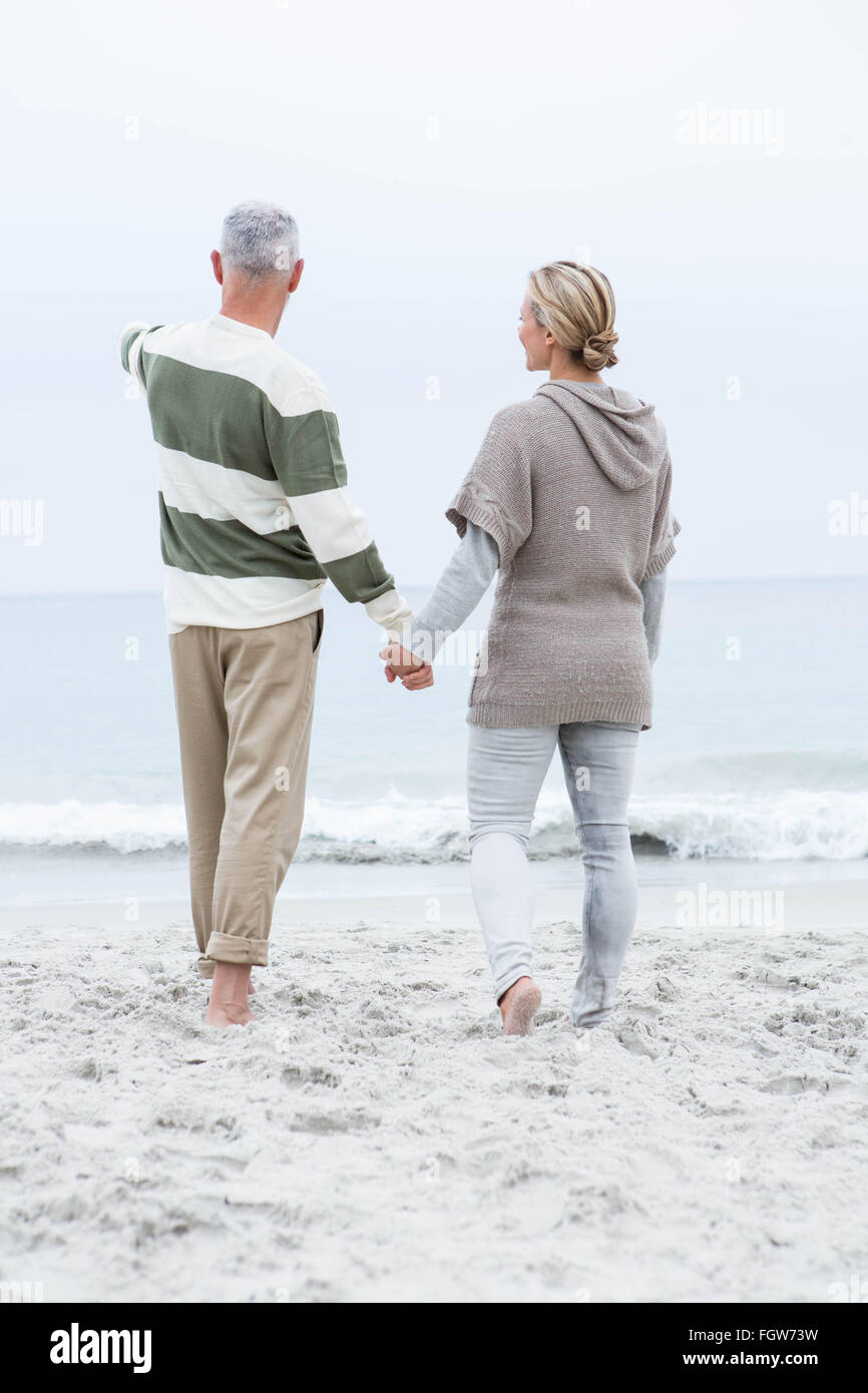 Mans hand holding clothes hi-res stock photography and images - Alamy