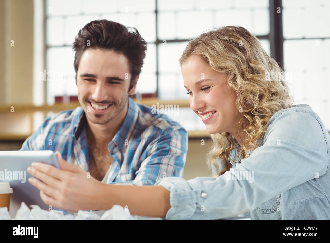 Business people smiling at office Stock Photo - Alamy