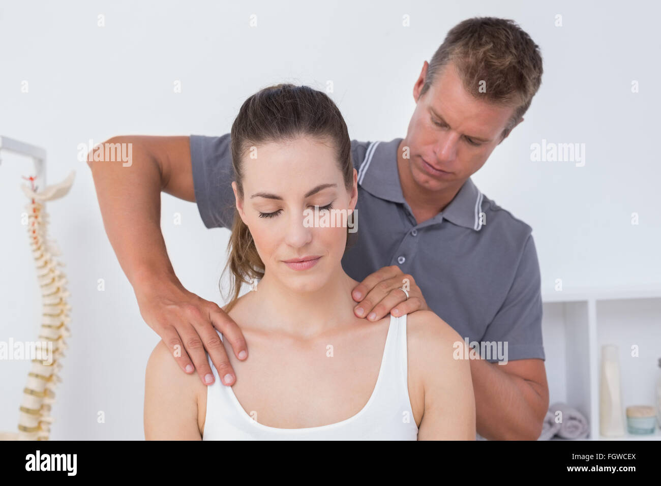 Doctor doing neck adjustment Stock Photo Alamy