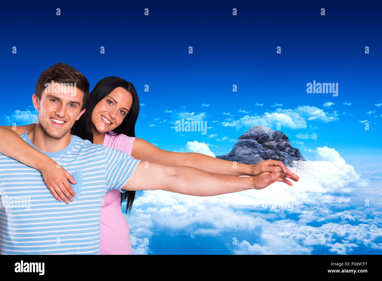 Composite image of young couple smiling at the camera Stock Photo - Alamy