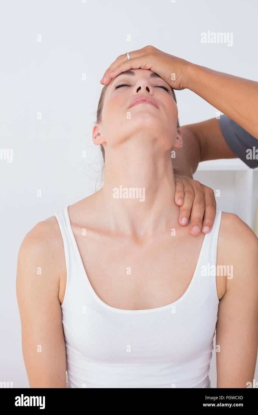 Doctor doing neck adjustment Stock Photo Alamy