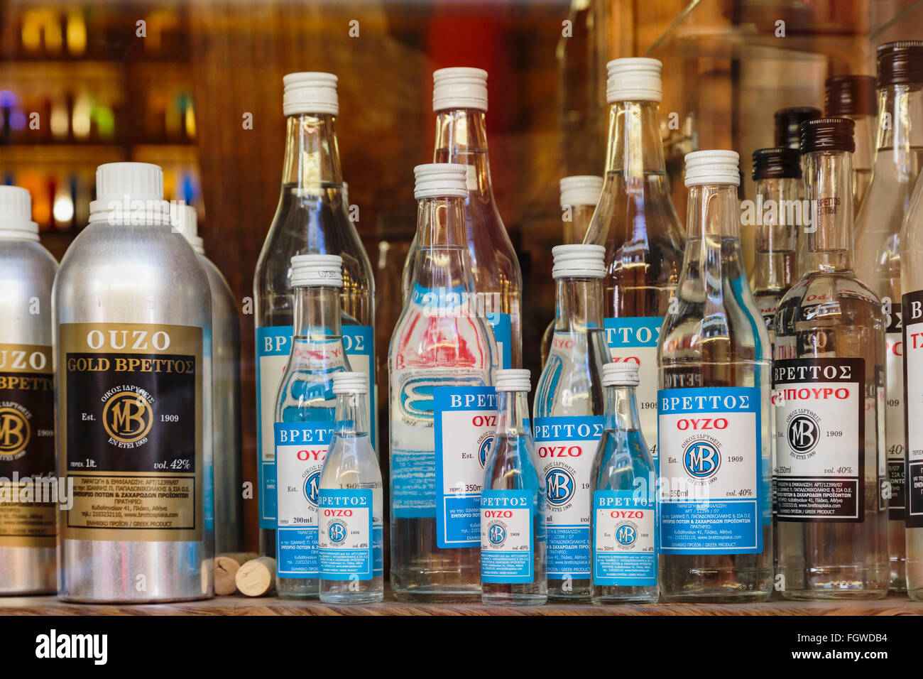 Athens, Attica, Greece.  Different sized bottles of ouzo in the Brettos shop in the Placa area. Stock Photo