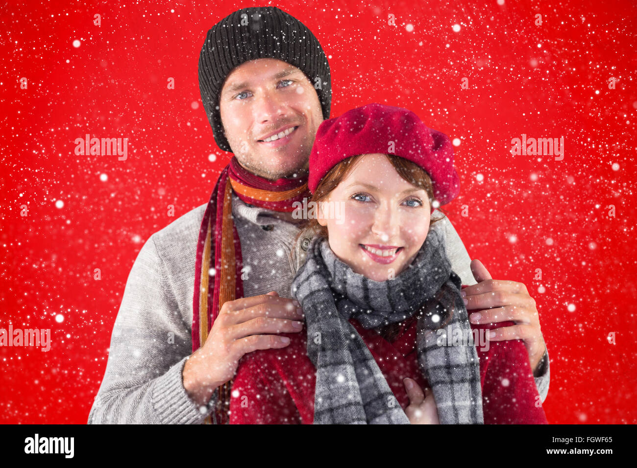 Composite image of couple smiling at the camera Stock Photo - Alamy