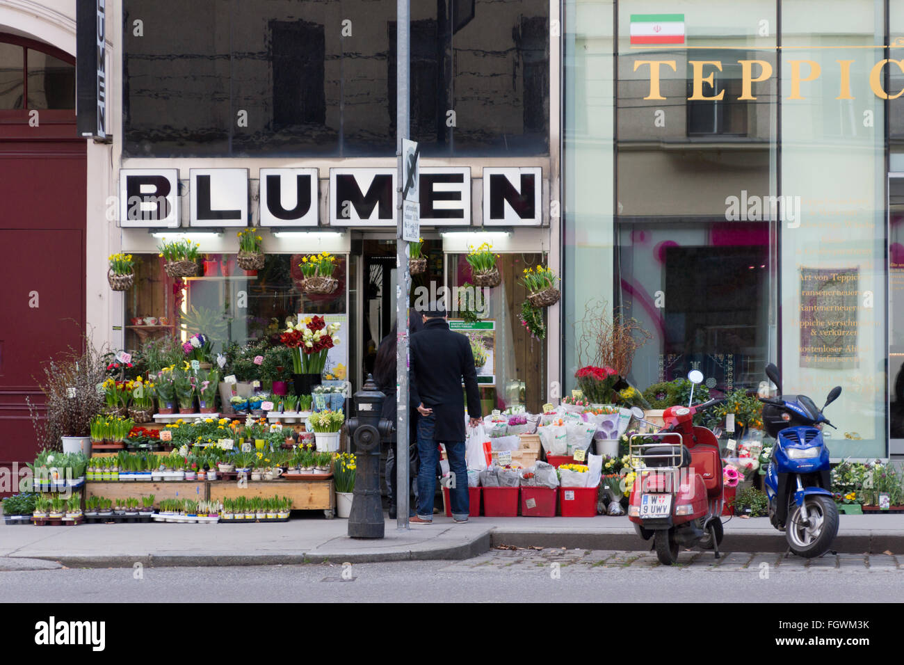 People buying flowers in Vienna Stock Photo
