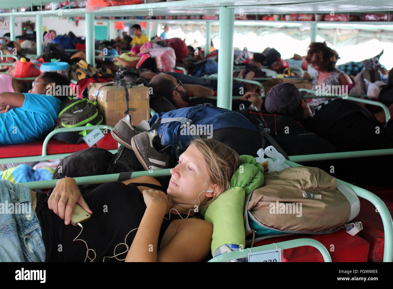 PALAWAN/PHILIPPINES - CIRCA DECEMBER 2015: People traveling on a vessel ferry between El Nido and Coron Stock Photo