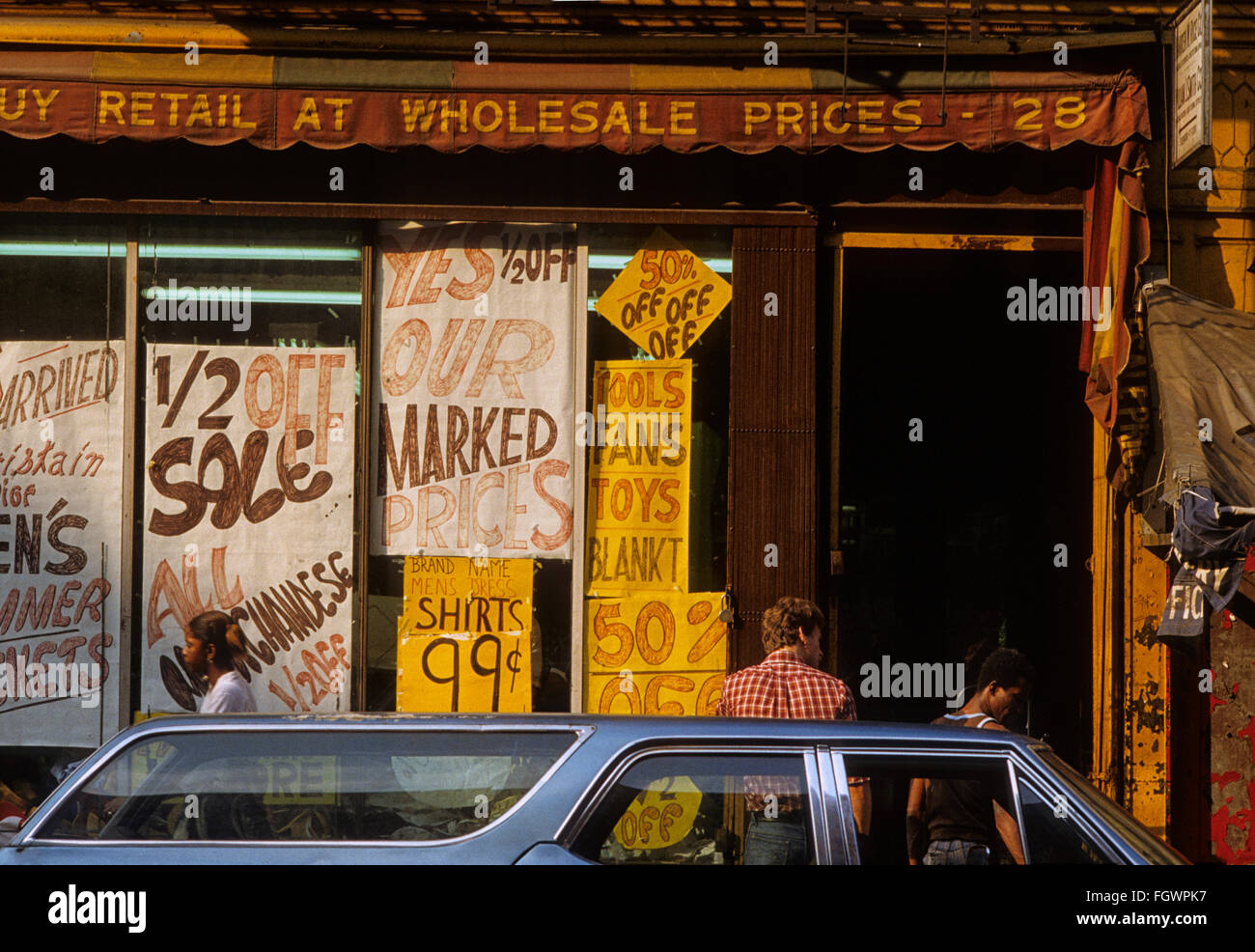 Discount clothing store in New York, 1981 Stock Photo Alamy