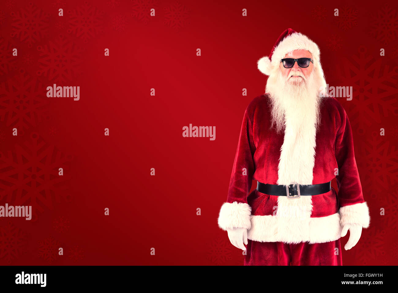 Composite image of santa claus wears black sunglasses Stock Photo - Alamy