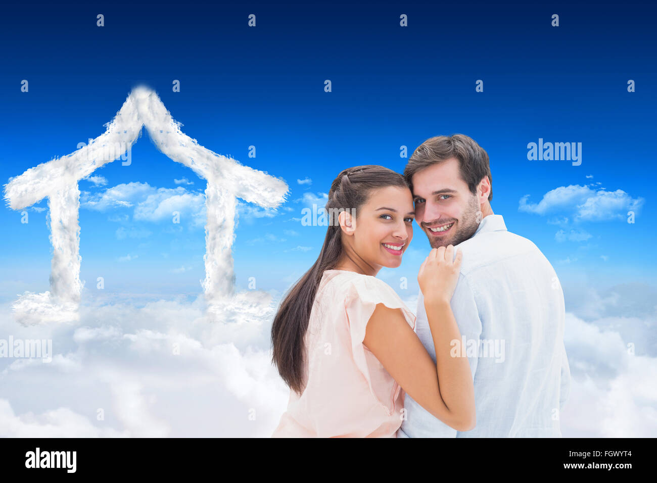 Composite image of attractive young couple smiling at camera Stock ...
