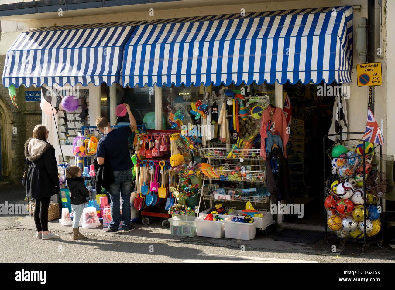 A traditional British seaside shop selling buckets and spades, beach