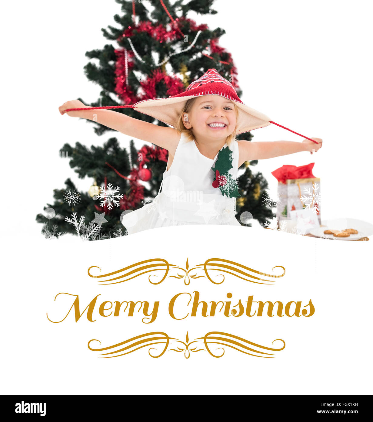 Composite image of festive little girl smiling at camera Stock Photo ...