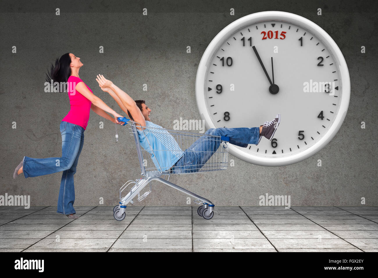Composite image of young couple having fun with shopping cart Stock ...