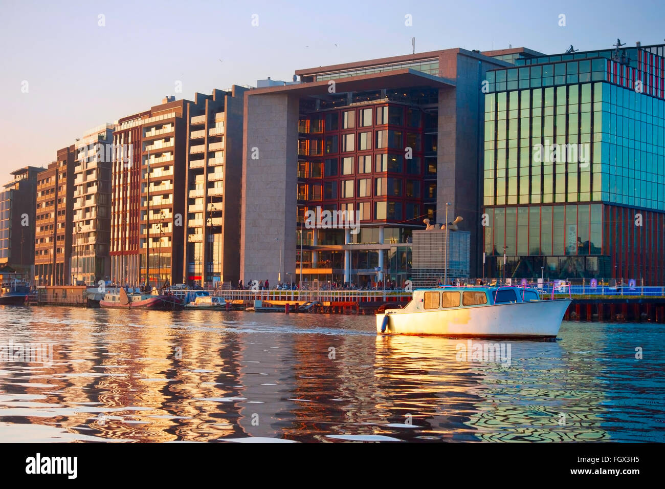 Modern architecture of Amsterdam with reflection in a river. Netherlands Stock Photo