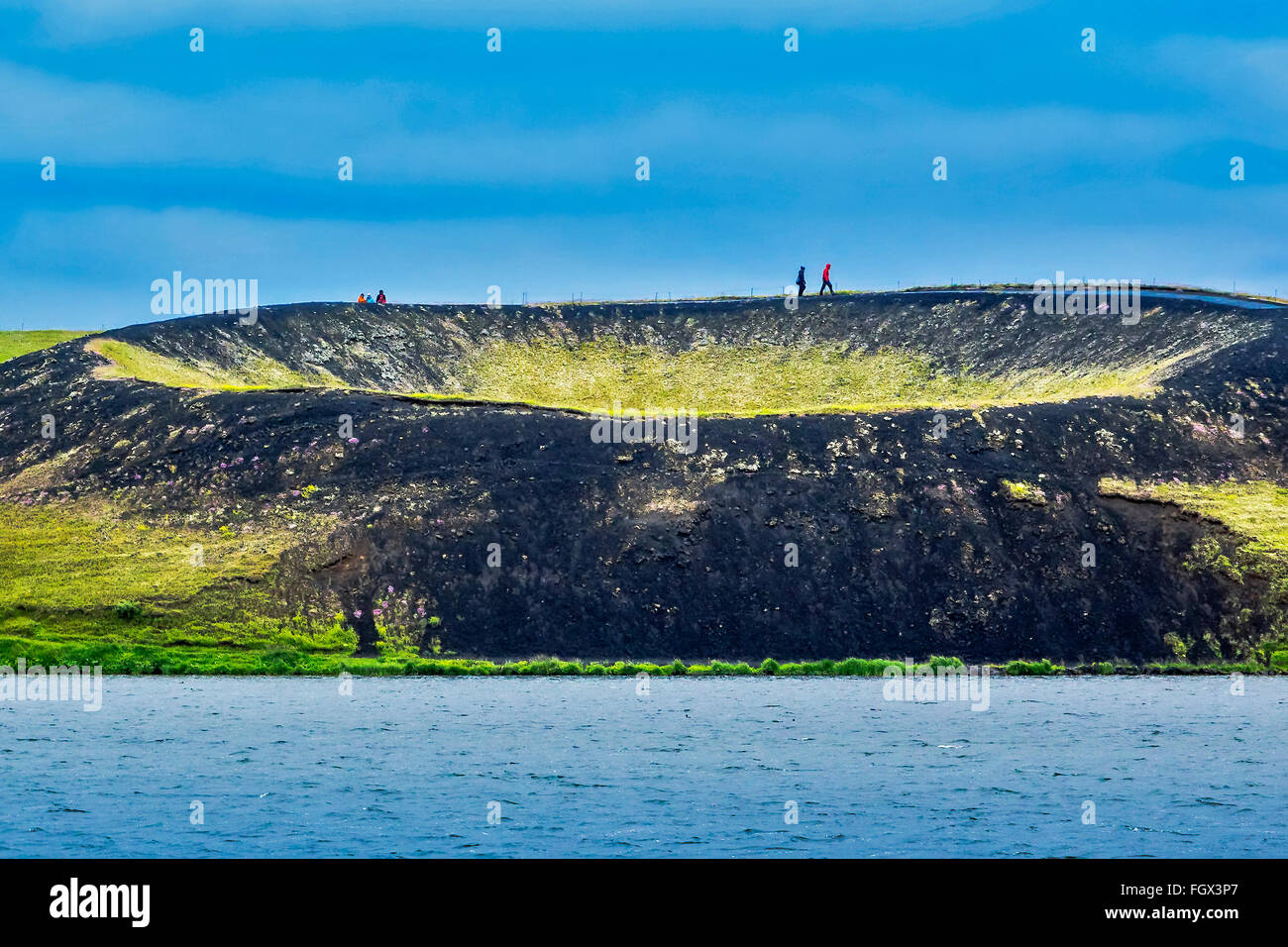 Walkers On A Crater Rim Akureyri Iceland Stock Photo