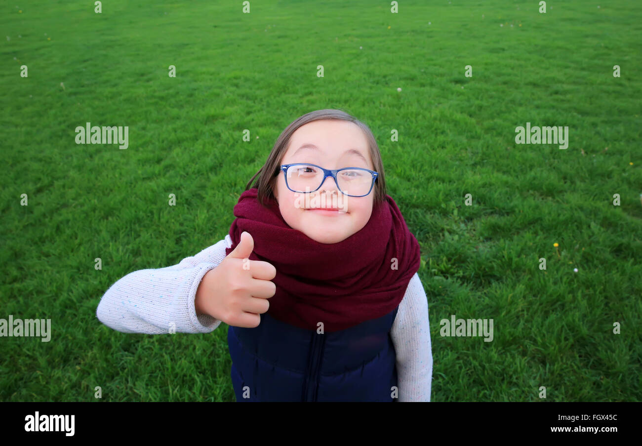Portrait of beautiful girl with glasses in the park Stock Photo - Alamy