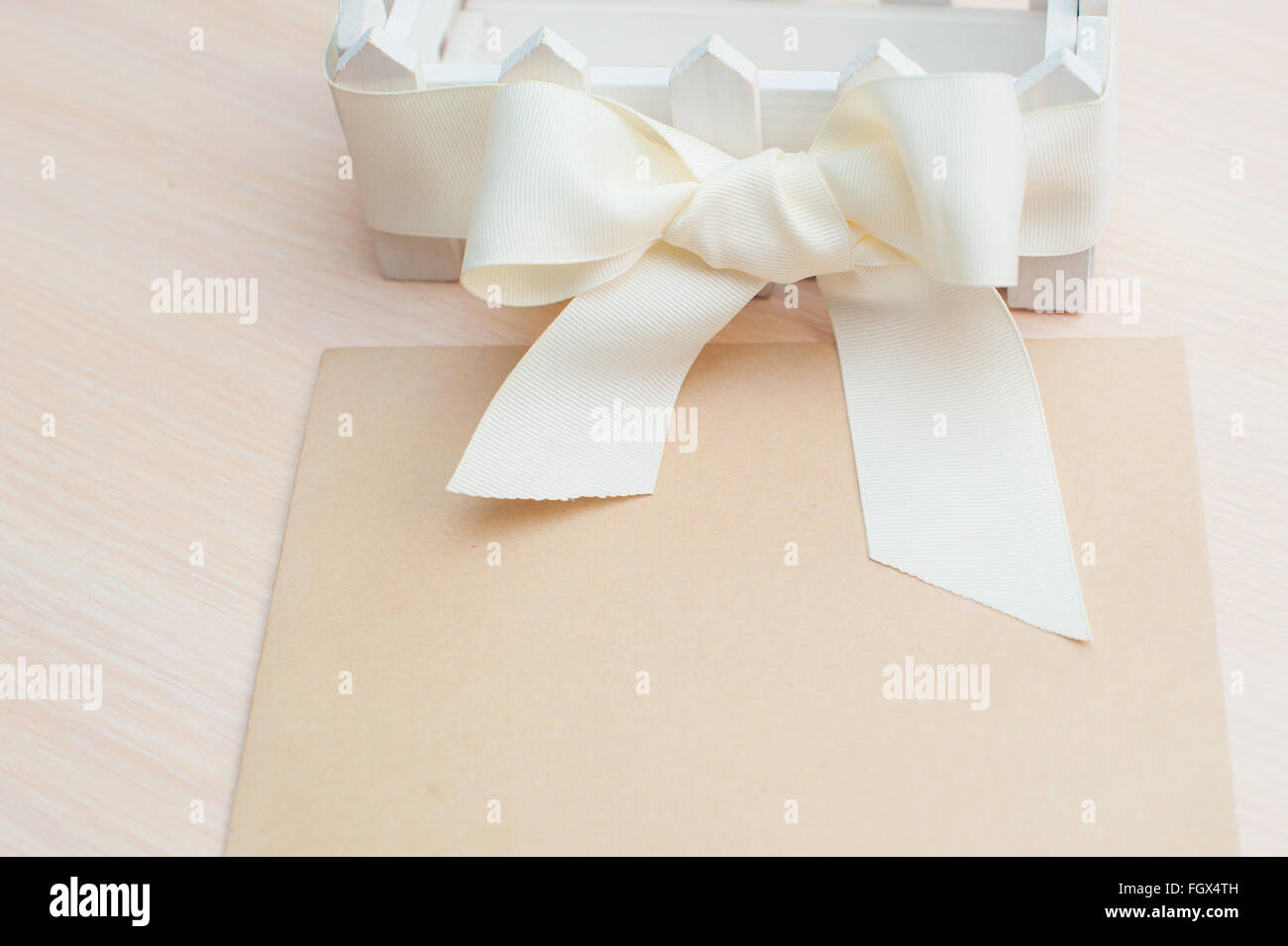 beautiful white bow kraft paper and space for text Stock Photo