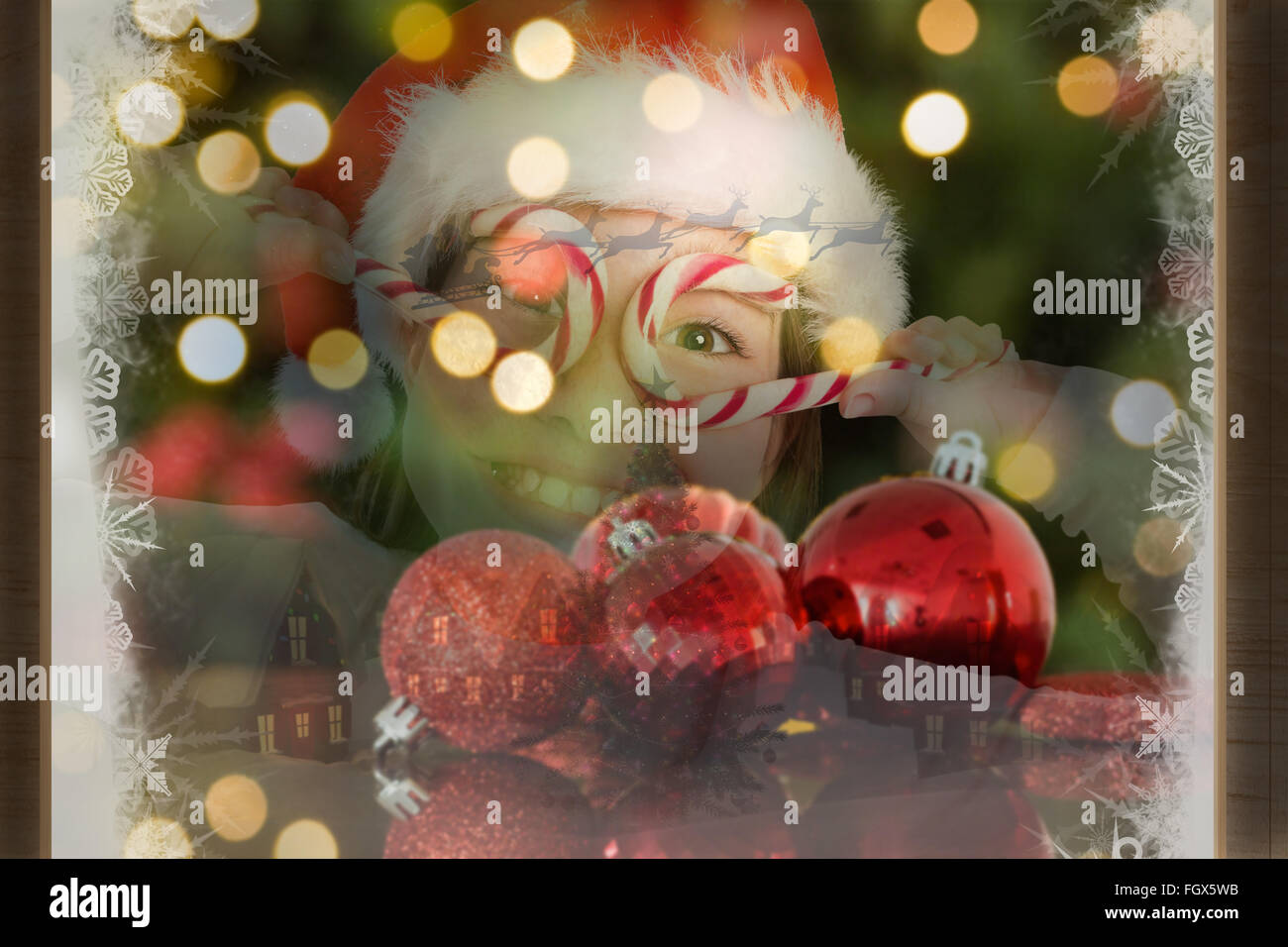 Composite image of festive little girl smiling at camera Stock Photo ...