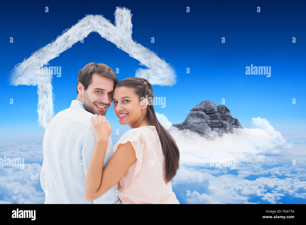 Composite image of attractive young couple smiling at camera Stock ...