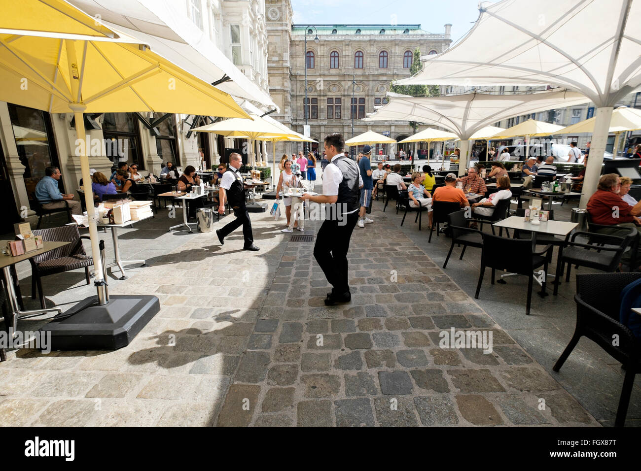 Outdoor terrace at the famous Cafe Mozart coffeehouse on Albertinaplatz in Vienna, Austria. Stock Photo
