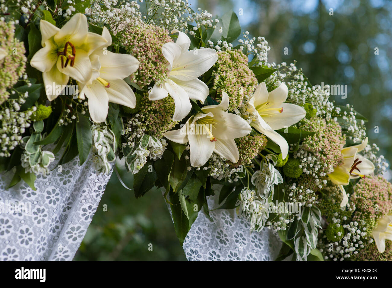 beautiful decorated wedding arch for the ceremony outdoor Stock Photo
