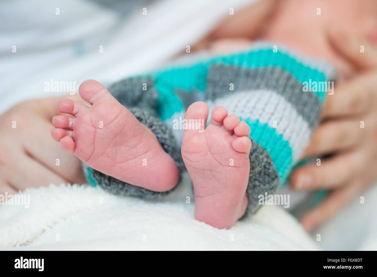 Closeup of baby feet hi-res stock photography and images - Alamy
