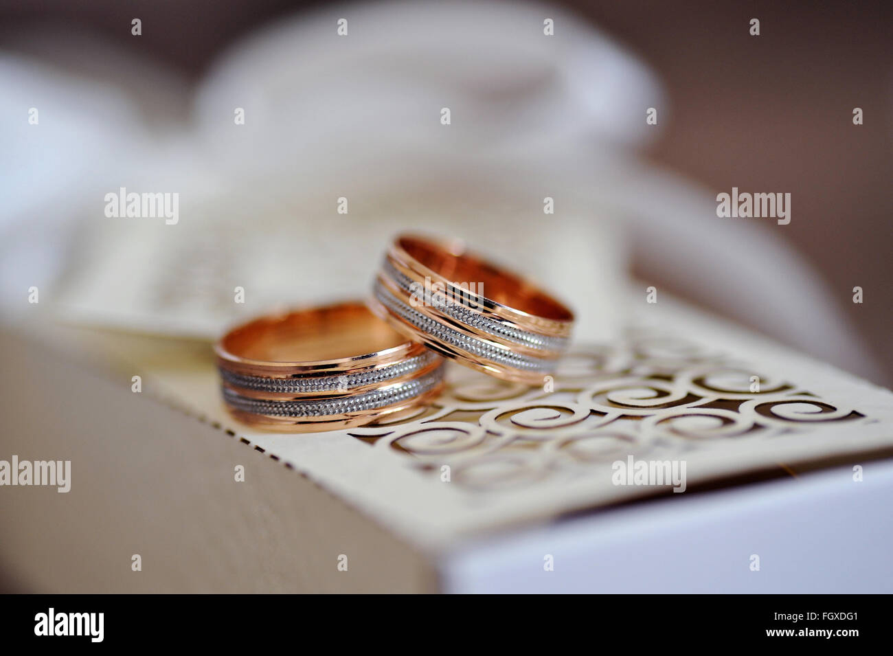 Beautiful Gold Wedding rings on cushion Stock Photo Alamy