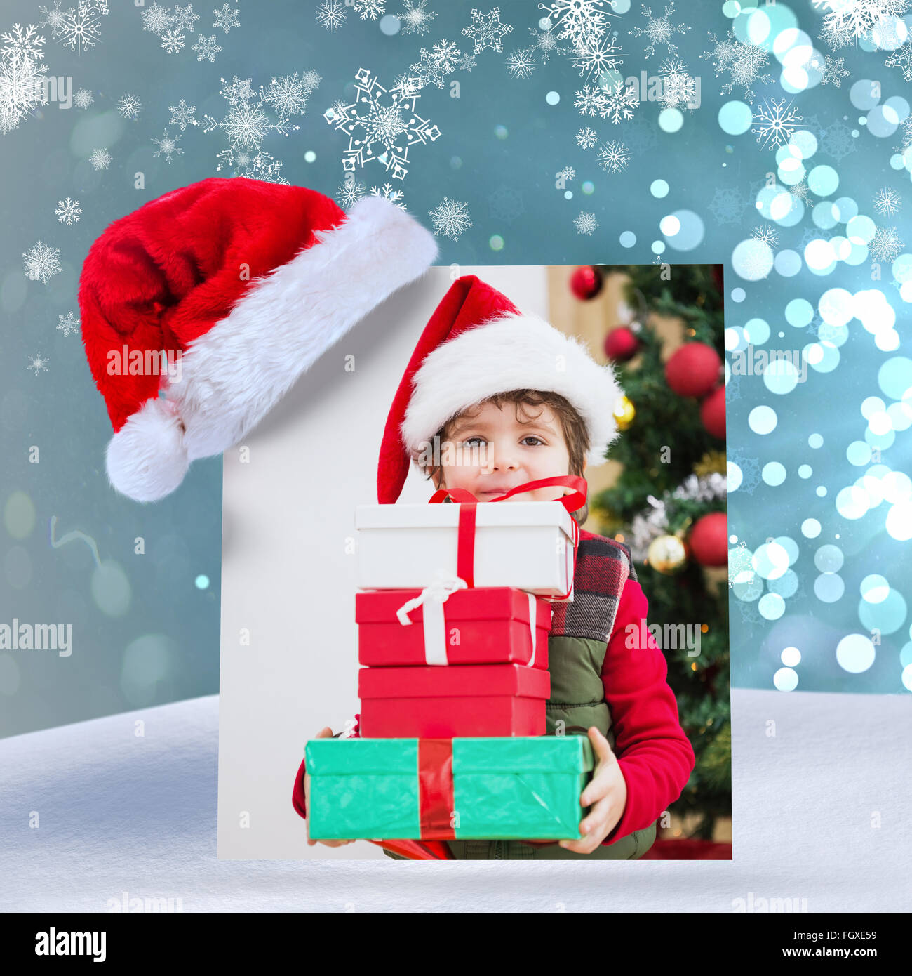 Composite image of cute festive little boy smiling at camera Stock ...