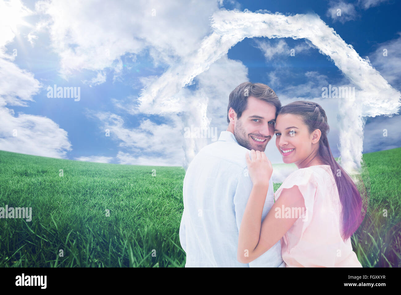 Composite image of attractive young couple smiling at camera Stock ...