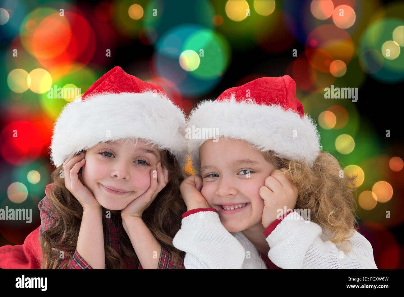 Composite image of festive little siblings smiling at camera Stock ...