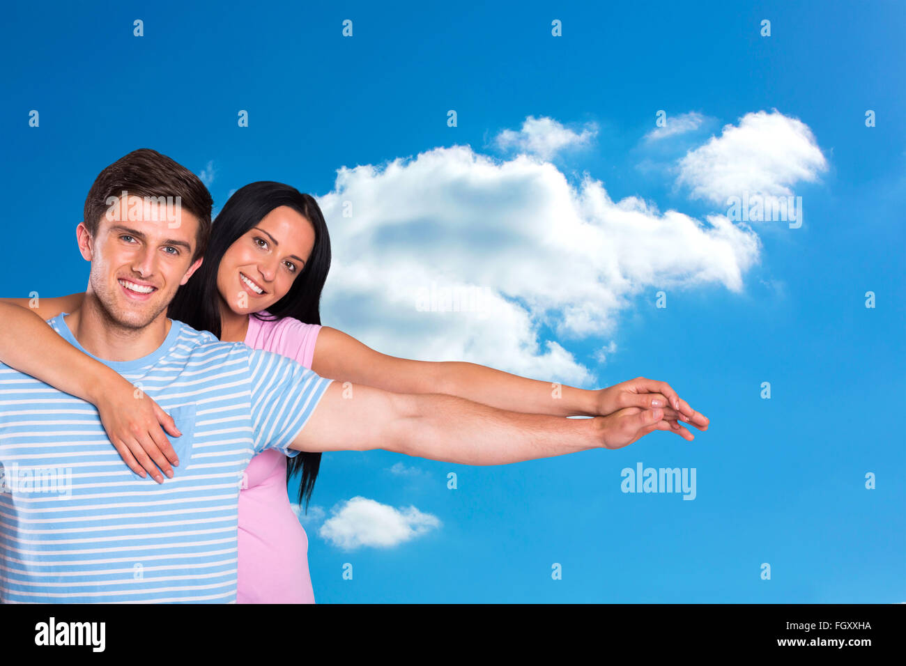 Composite image of young couple smiling at the camera Stock Photo - Alamy