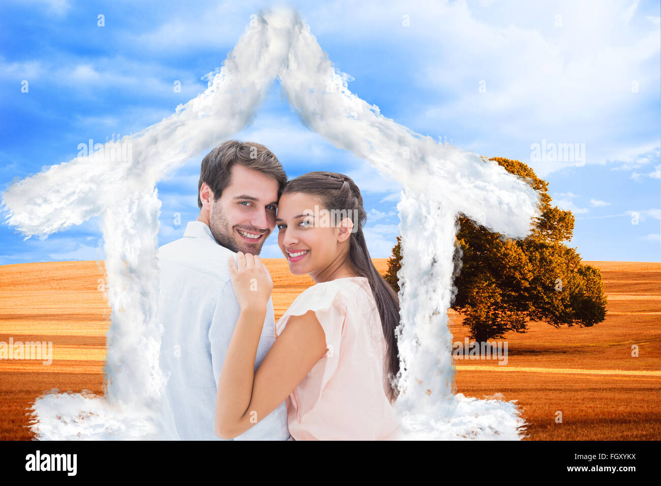 Composite image of attractive young couple smiling at camera Stock ...