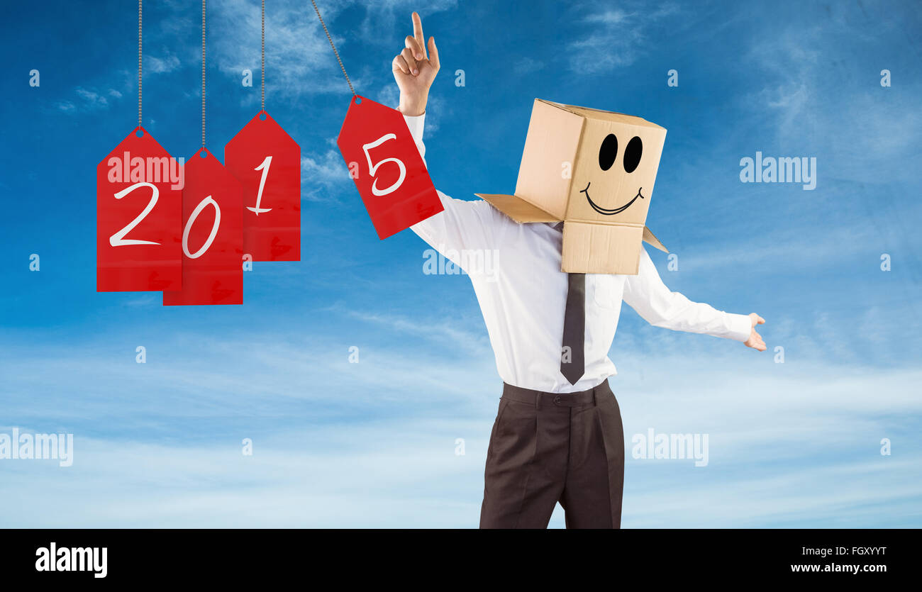 Composite image of anonymous businessman with arms out Stock Photo
