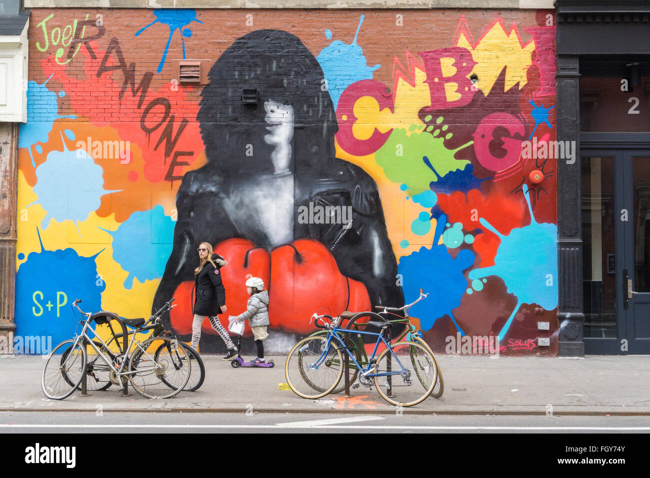 A mural by artists Solus and John (Crash) Matos off the Bowery in New York pays tribute to CBGB's and the late musician Joey Ramone, seen on Saturday, February 20, 2016. The mural commemorates the 41st anniversary of the Ramones' appearance at the iconic CBGB club and was organized by the Little Italy Street Art Project. (© Richard B. Levine) Stock Photo